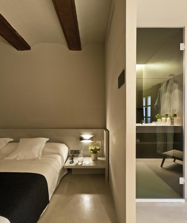 Caro Hotel Valencia Exterior photo A room at the hotel